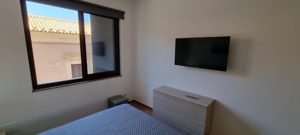 TV a/nebo společenská místnost v ubytování Casa Diaz