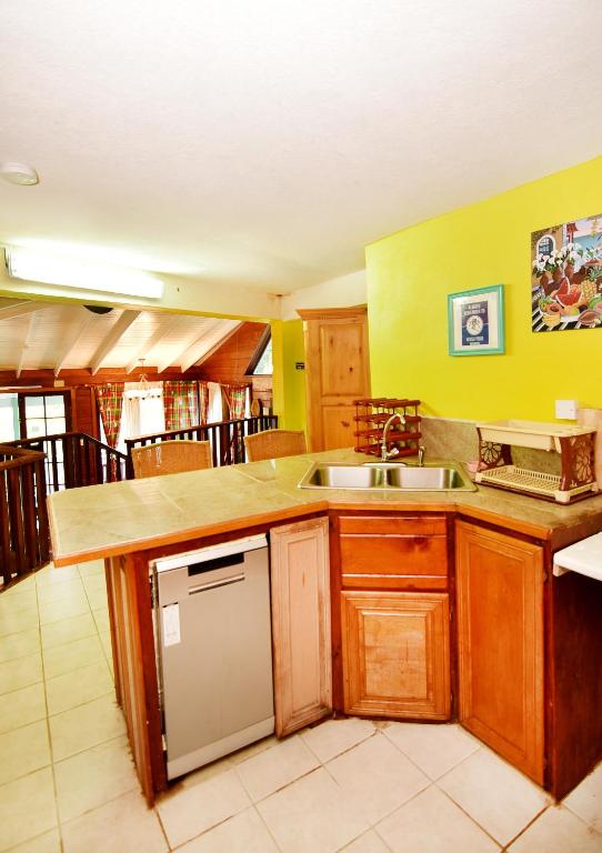 Kuchyň nebo kuchyňský kout v ubytování Beachfront Cottage