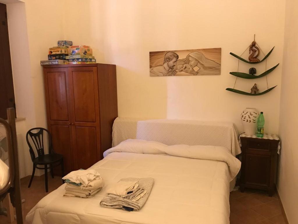 Postel nebo postele na pokoji v ubytování Casa delle Fate