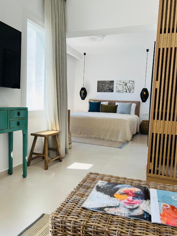 Posteľ alebo postele v izbe v ubytovaní Portobello Boutique Hotel