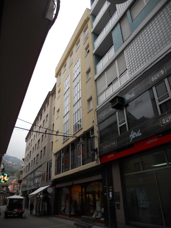 a group of buildings on a city street at Casa Baratura in Cangas del Narcea