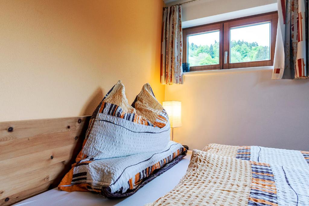 Postel nebo postele na pokoji v ubytování Haus grüner Wald