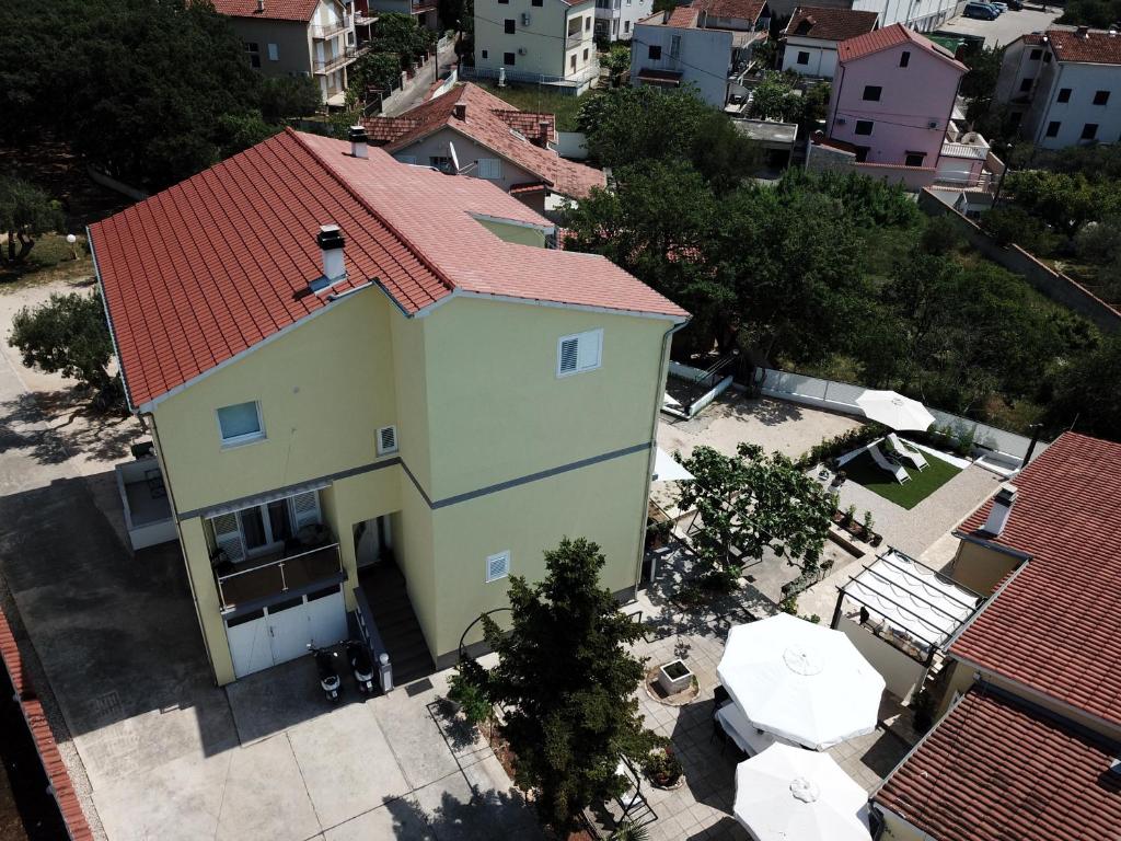 an overhead view of a house with a red roof at House Roca in Vodice
