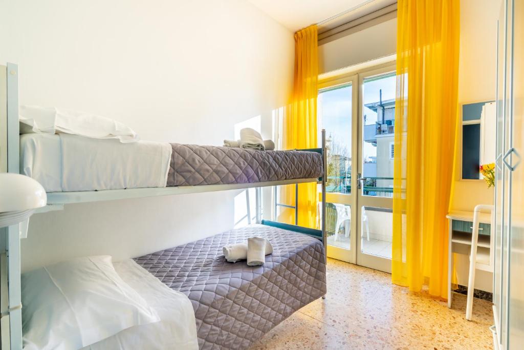 Postel nebo postele na pokoji v ubytování Hotel Viscount