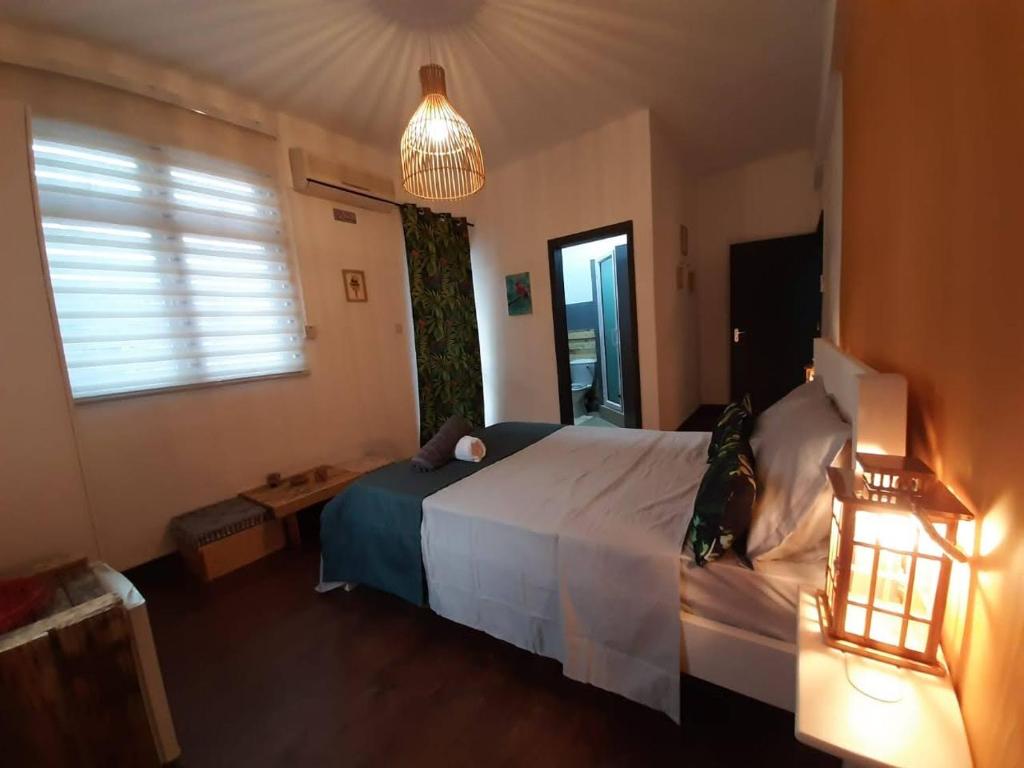 Postel nebo postele na pokoji v ubytování Eden Villa