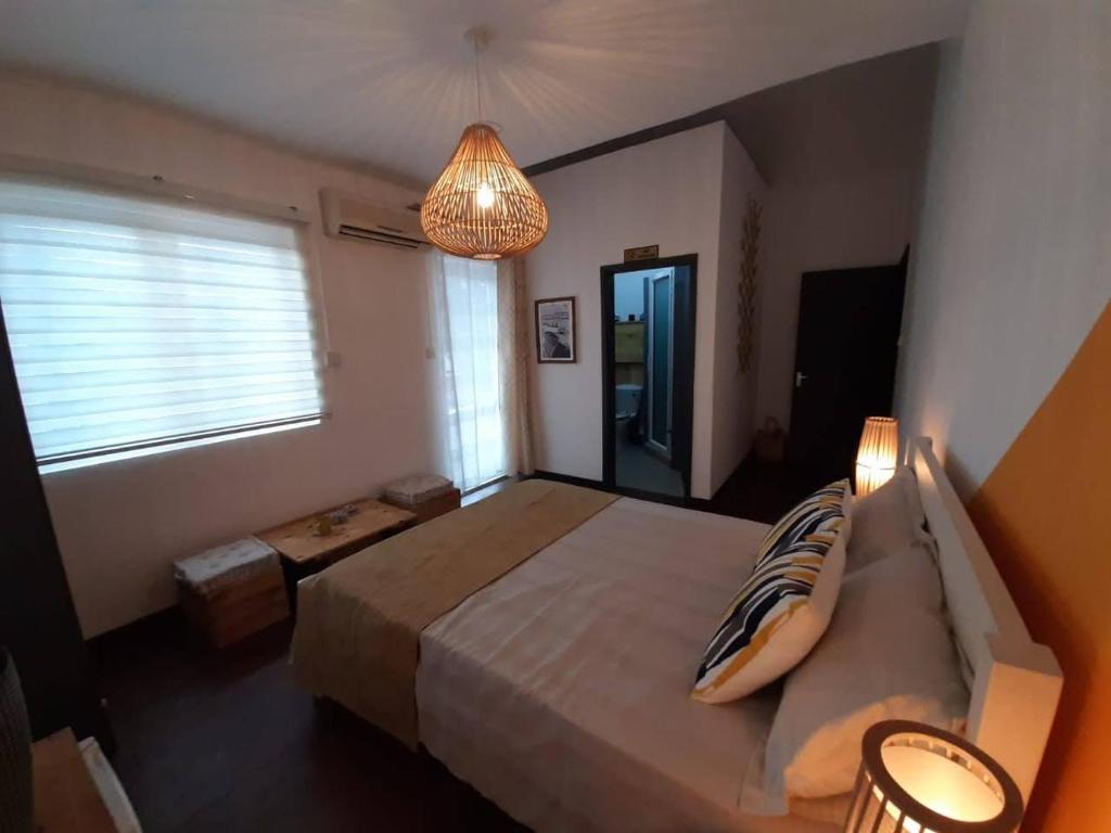Postel nebo postele na pokoji v ubytování Eden Villa