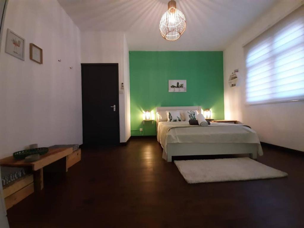 Postel nebo postele na pokoji v ubytování Eden Villa