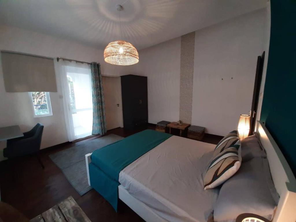 Postel nebo postele na pokoji v ubytování Eden Villa