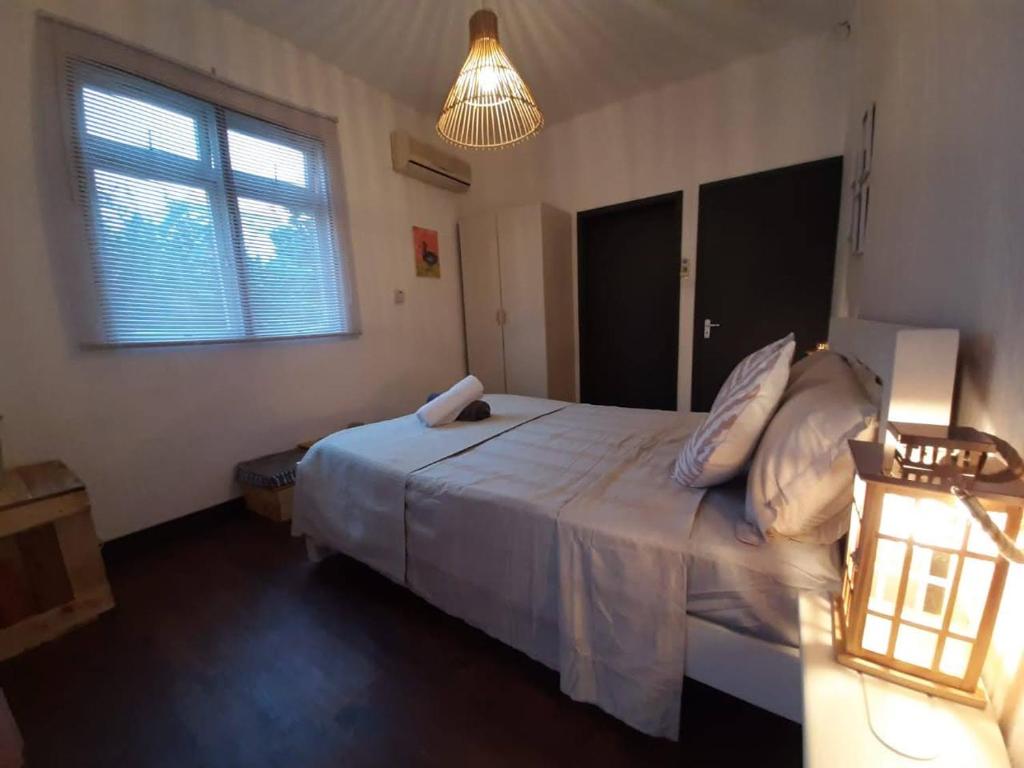 Postel nebo postele na pokoji v ubytování Eden Villa