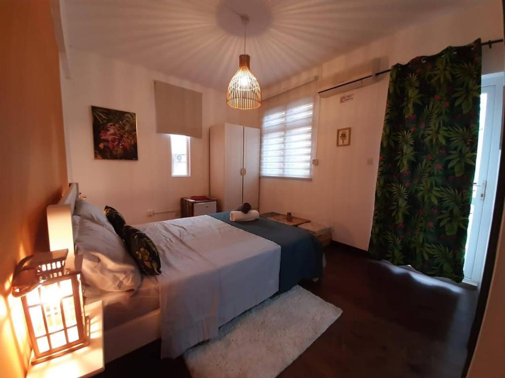 Postel nebo postele na pokoji v ubytování Eden Villa