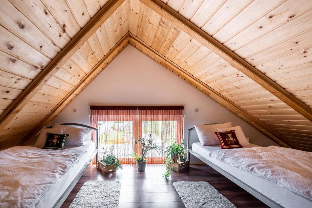 Posteľ alebo postele v izbe v ubytovaní Apartman Tea