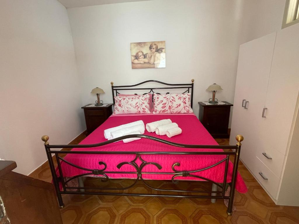 Posteľ alebo postele v izbe v ubytovaní Casa Rosy