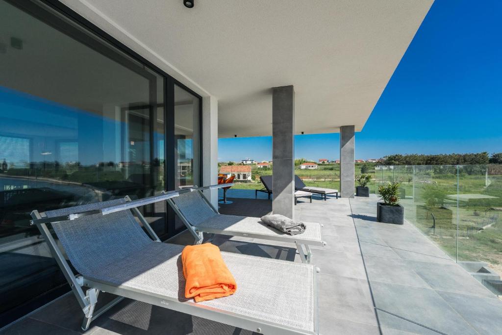 Posedenie v ubytovaní Penthouse Jimmys Beach Privlaka, Wahnsinns Blick und beheiztem Pool