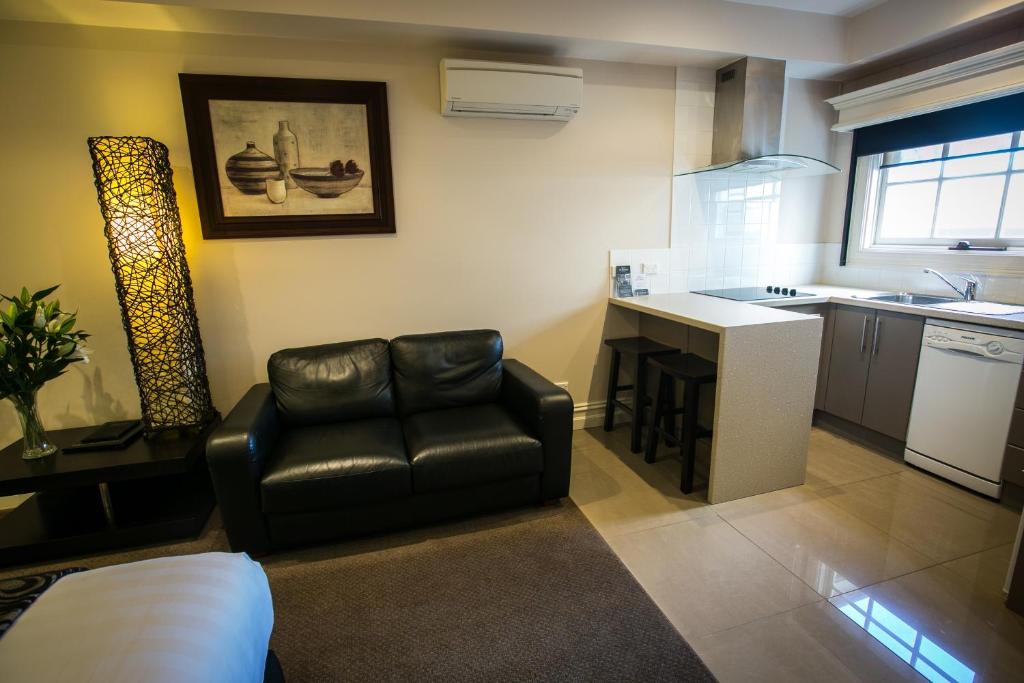 Kuchyň nebo kuchyňský kout v ubytování Gallery Apartments