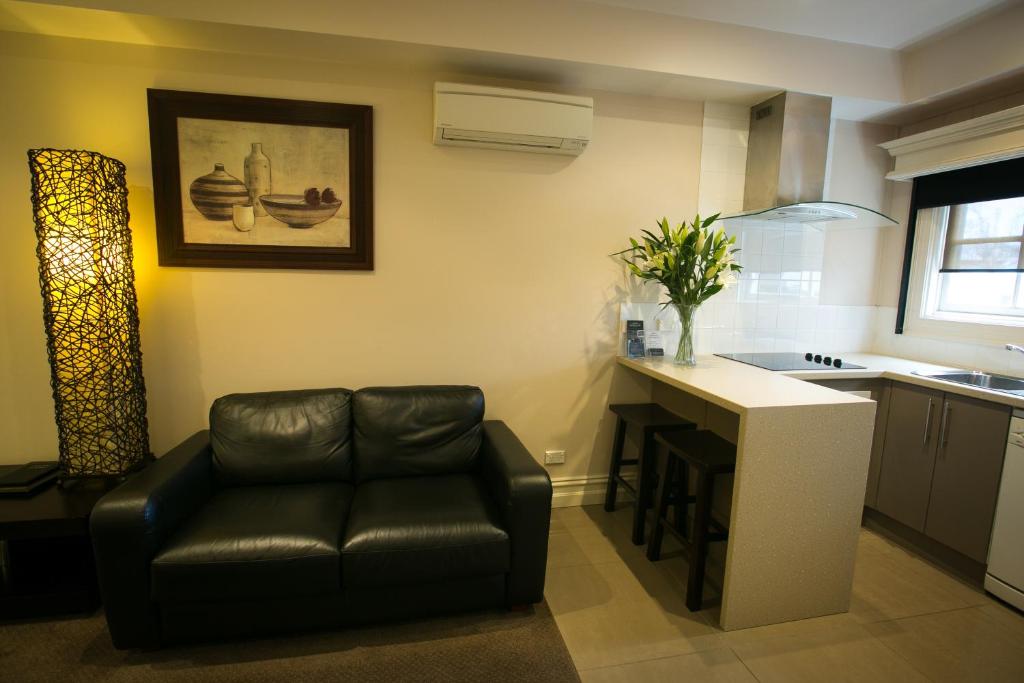 Kuchyň nebo kuchyňský kout v ubytování Gallery Apartments