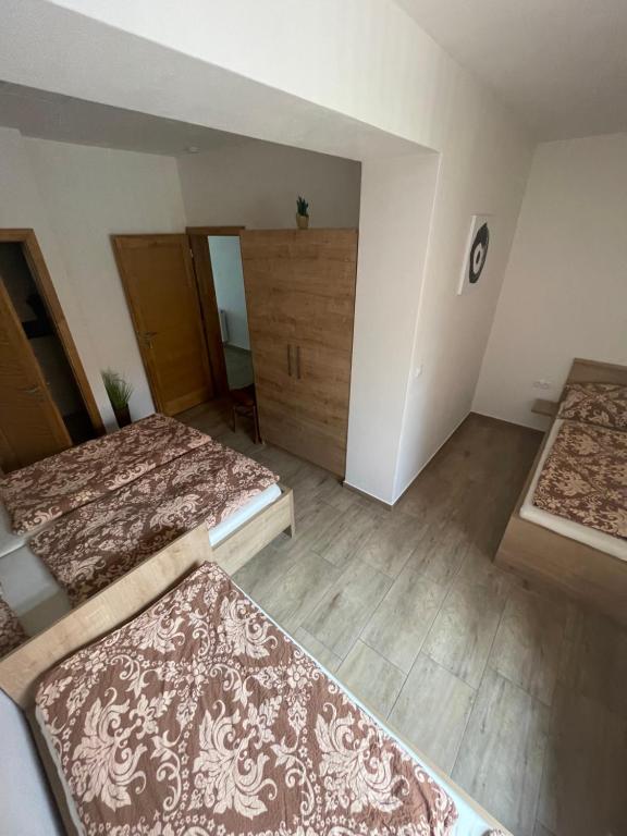 Postel nebo postele na pokoji v ubytování Rodinný penzion Kohoutek