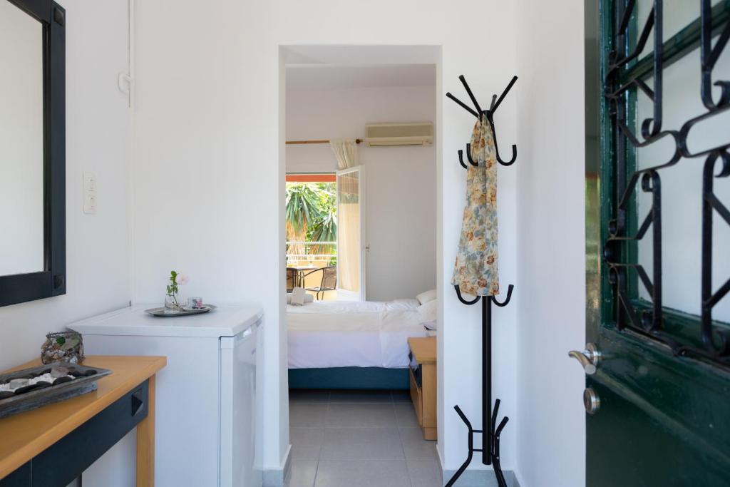 Postel nebo postele na pokoji v ubytování Wilde Rose Hotel