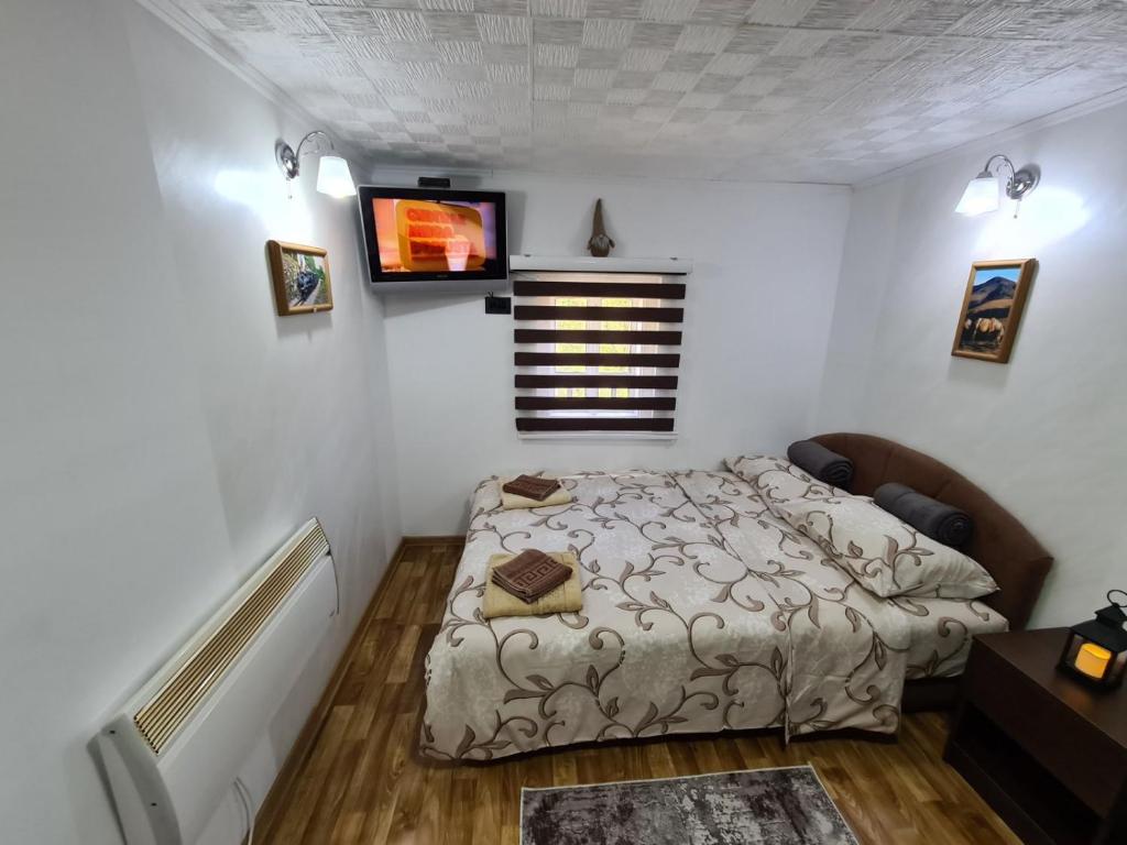 Postel nebo postele na pokoji v ubytování Apartman Koja