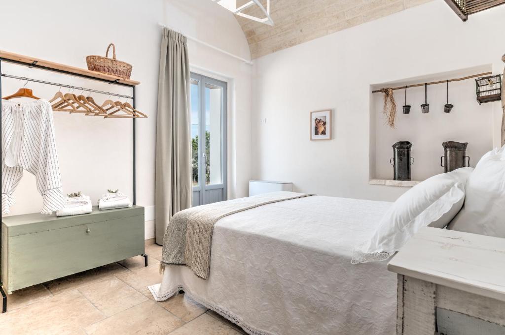 Letto o letti in una camera di Borgo Altobello