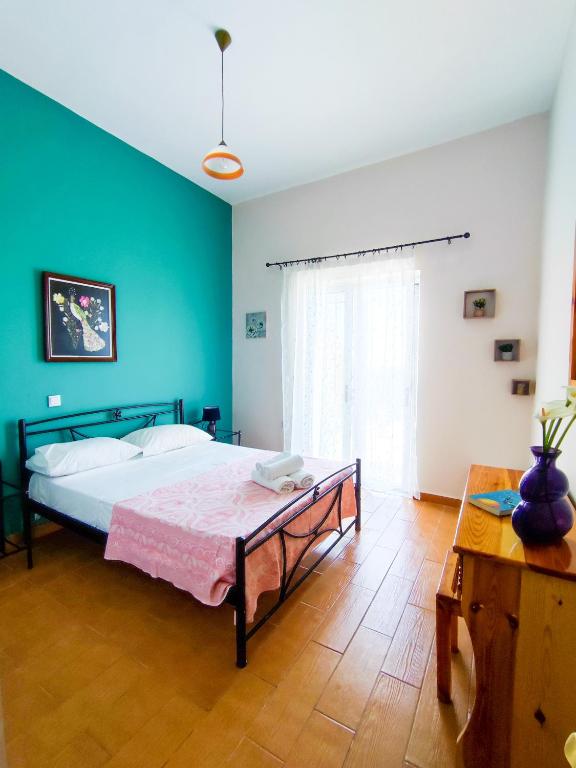 Postel nebo postele na pokoji v ubytování Sette Isole Countryside Retreat Near Egremni Beach