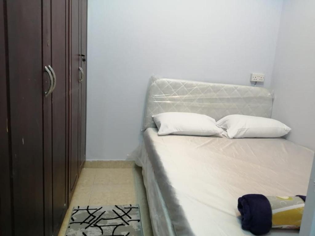 Postel nebo postele na pokoji v ubytování AlBarsha 1 Hostel by PHM