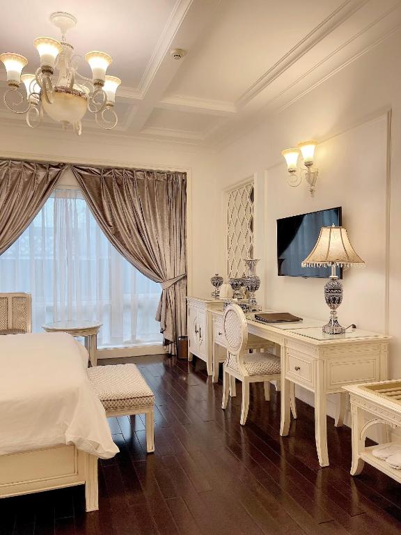 TV a/nebo společenská místnost v ubytování Eldora Hotel