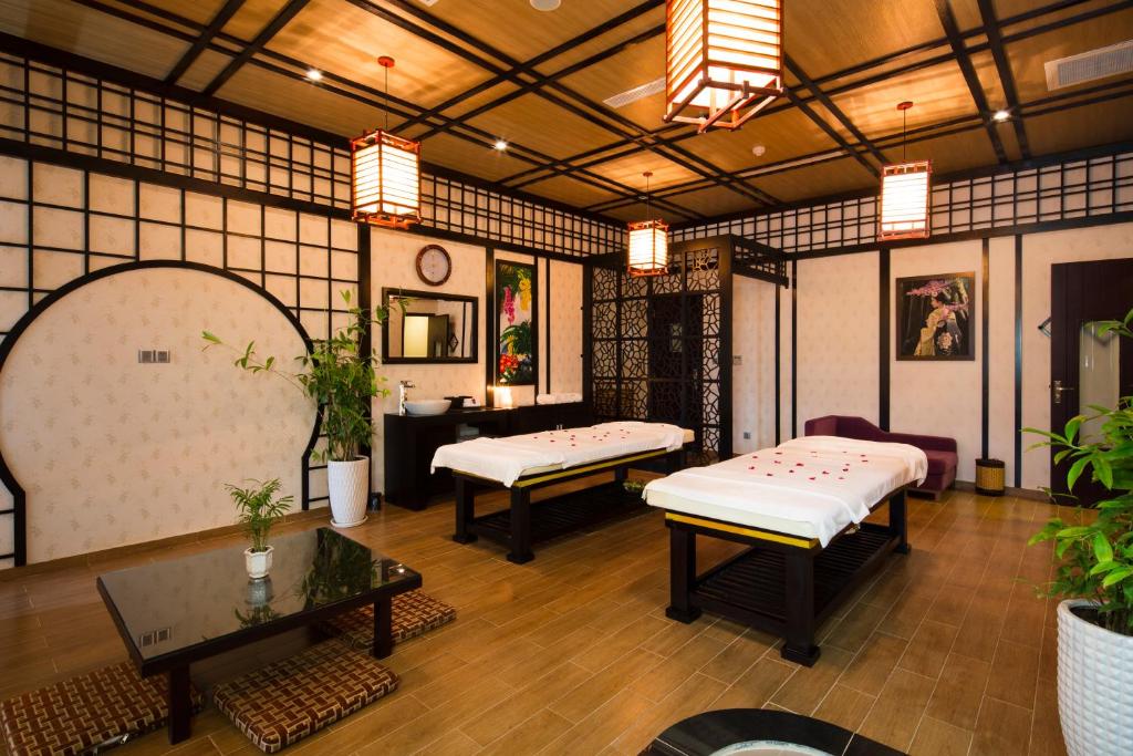 Giường trong phòng chung tại Galina Hotel & Spa