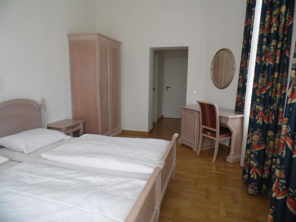 Postel nebo postele na pokoji v ubytování Augustenhof