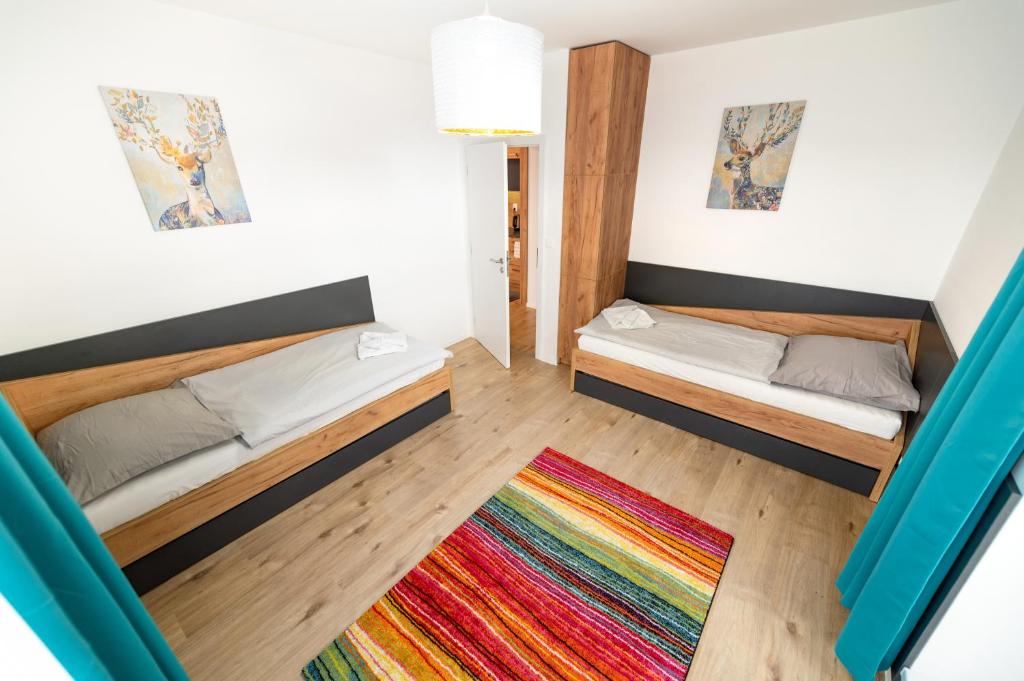Postel nebo postele na pokoji v ubytování Apartmán 110 Vila Zuberec