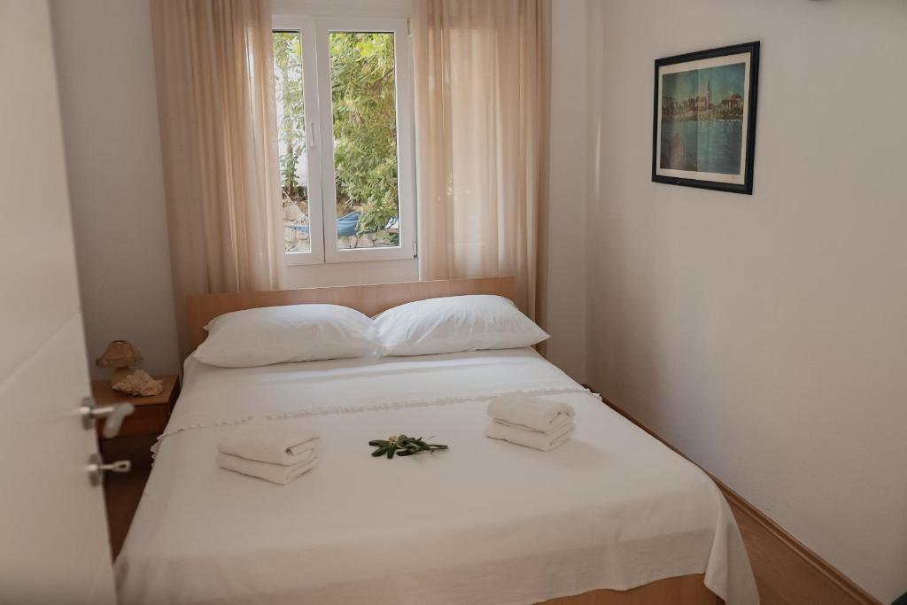 Posteľ alebo postele v izbe v ubytovaní Apartments Prce