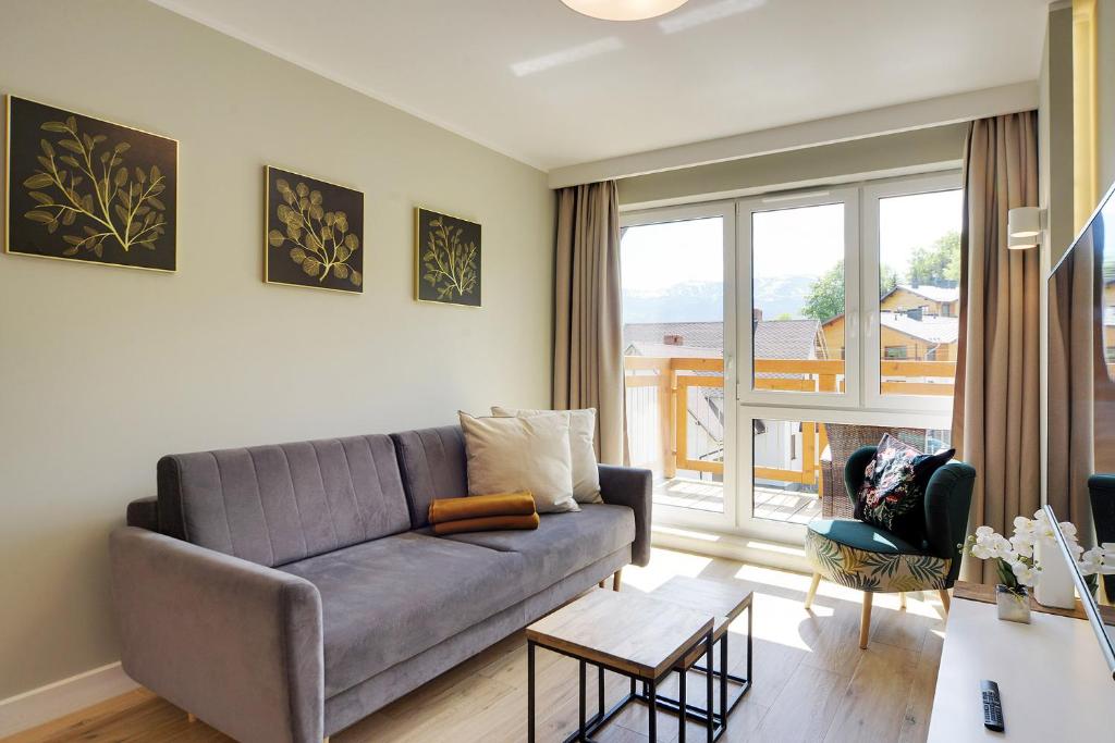 Posedenie v ubytovaní Przytulne Apartamenty Sun Seasons 24 z Pięknym Widokiem w Szklarskiej Porębie by Noclegi Renters