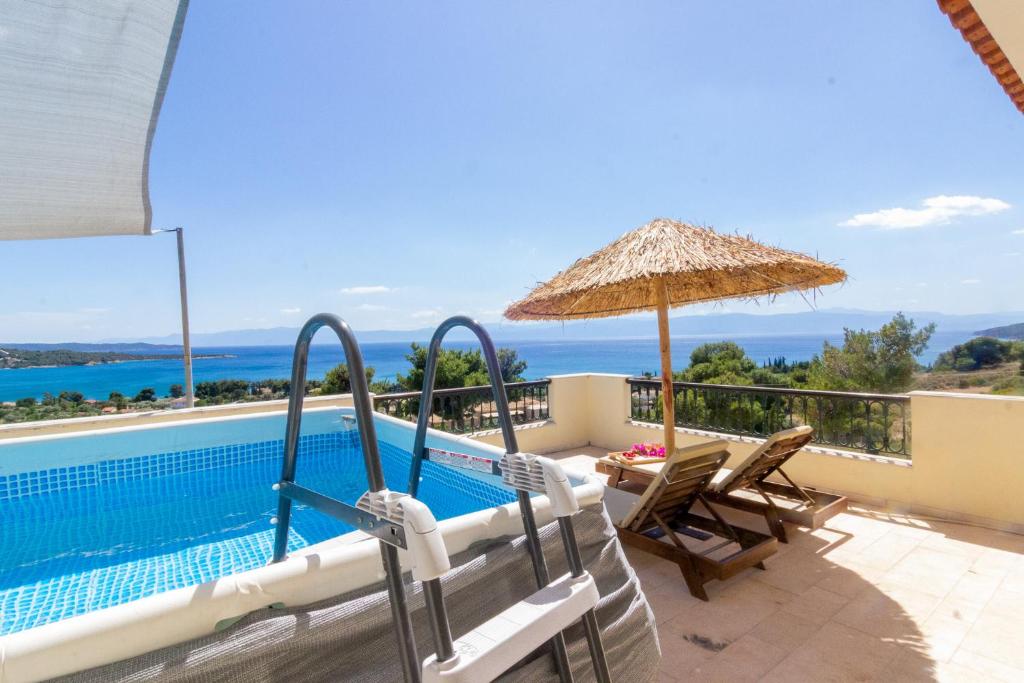 Fotografia z galérie ubytovania House with amazing ocean view and patio - pool v destinácii Porto Heli