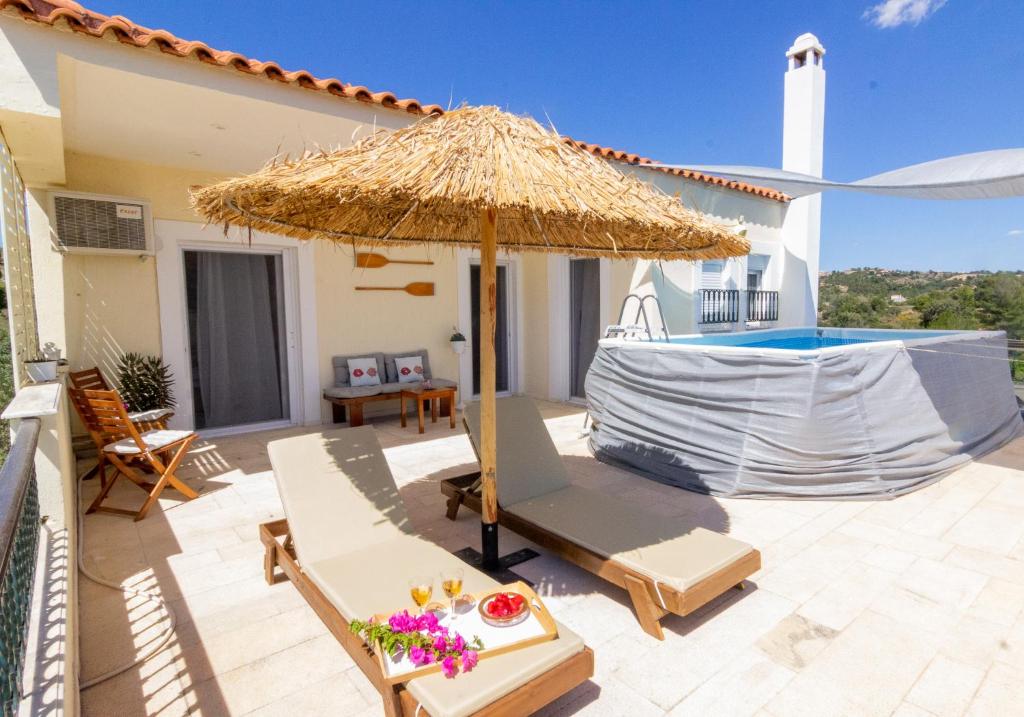 Fotografia z galérie ubytovania House with amazing ocean view and patio - pool v destinácii Porto Heli