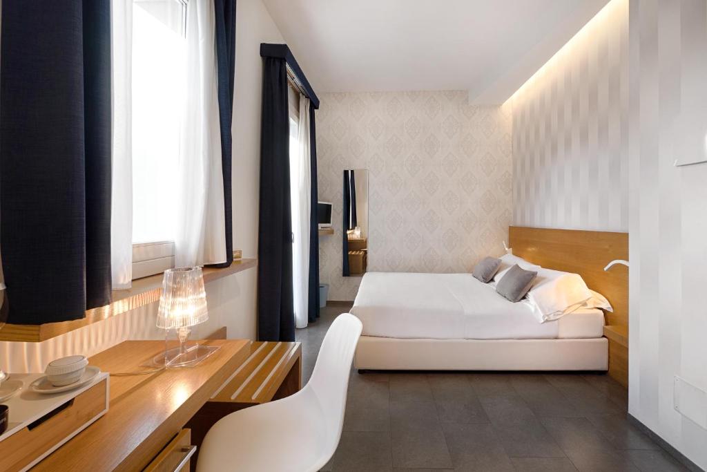 Postel nebo postele na pokoji v ubytování Iblaresort Boutique Hotel
