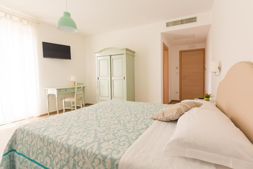 Postel nebo postele na pokoji v ubytování B&B Toma'
