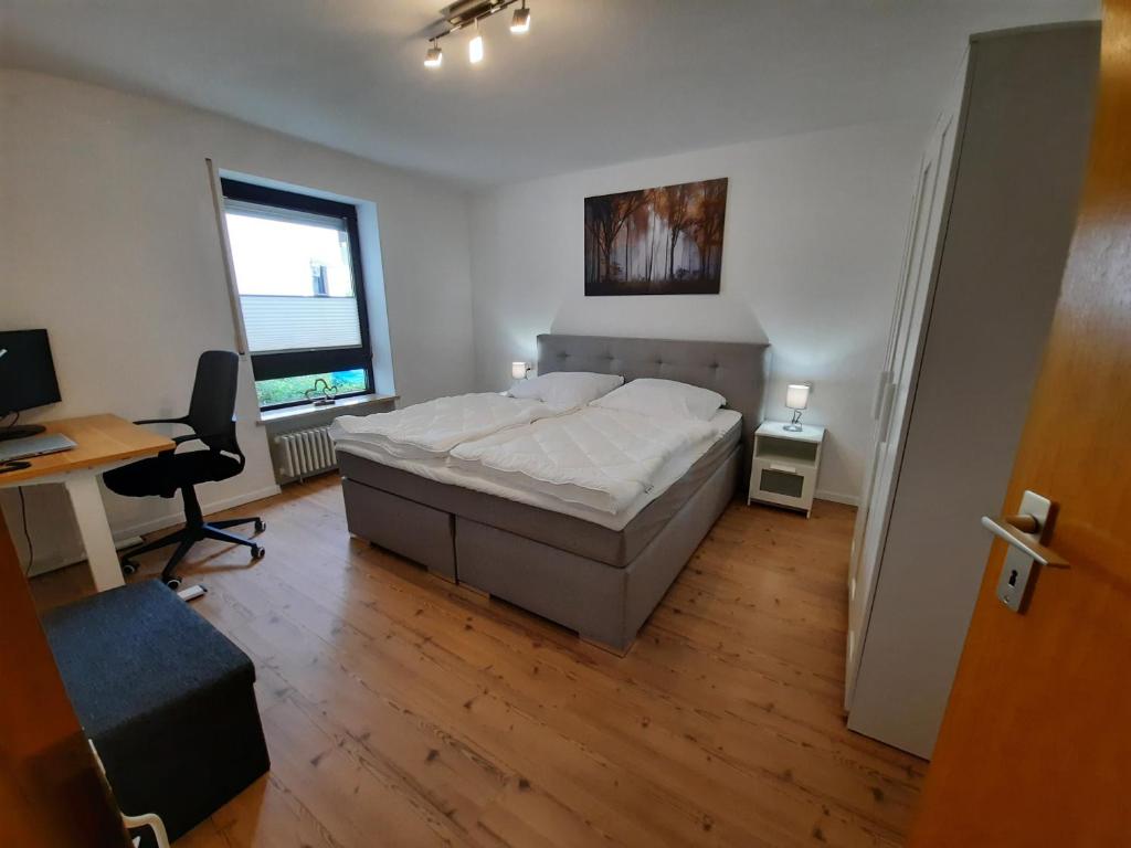 Postel nebo postele na pokoji v ubytování Ferienwohnung-Einklang im schönen Südschwarzwald