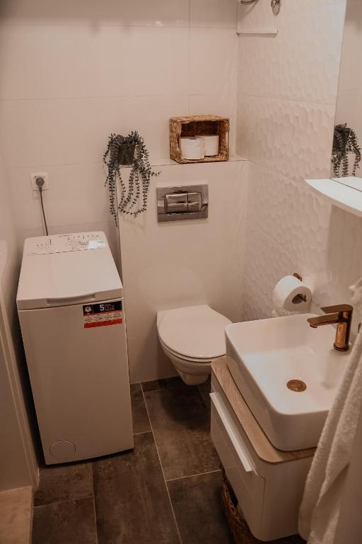Kúpeľňa v ubytovaní Apartments Prce