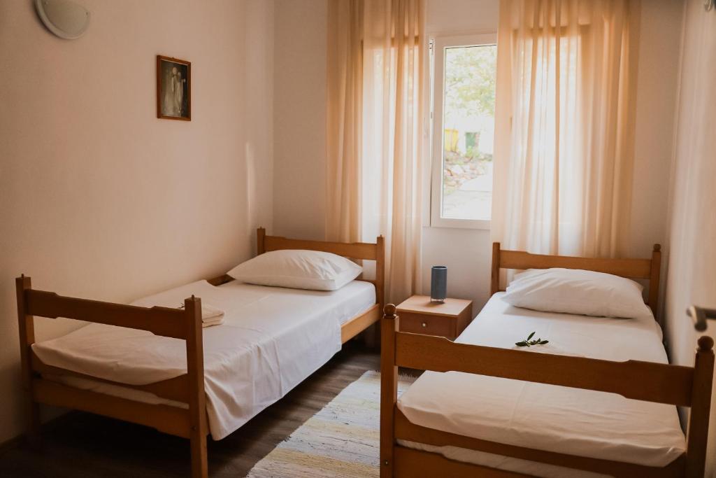 Posteľ alebo postele v izbe v ubytovaní Apartments Prce