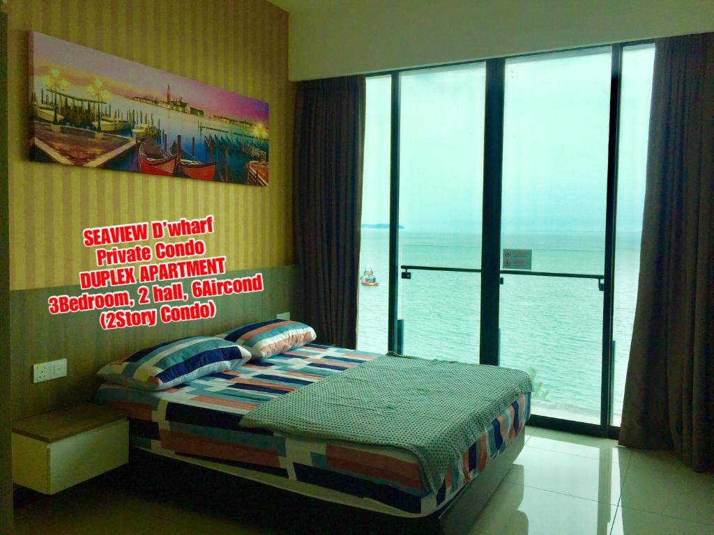 Postel nebo postele na pokoji v ubytování D Wharf Port Dickson Private Condo Waterfront