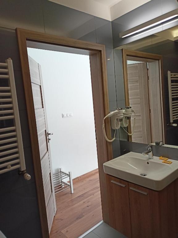 Koupelna v ubytování Marina Plaza Apartamenty