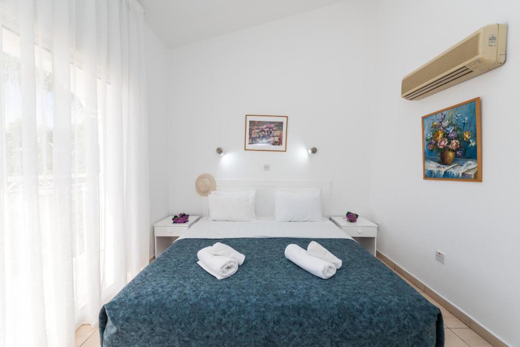 Postel nebo postele na pokoji v ubytování Fig Tree Z Holiday Resort