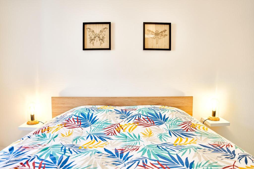 Postel nebo postele na pokoji v ubytování OFFRE SPECIALE Centre Verdun - Idéal Famille - Le Châtelois