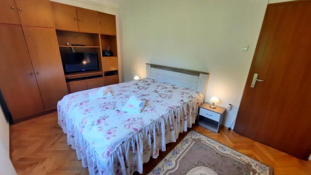 Postel nebo postele na pokoji v ubytování Apartma Bajc