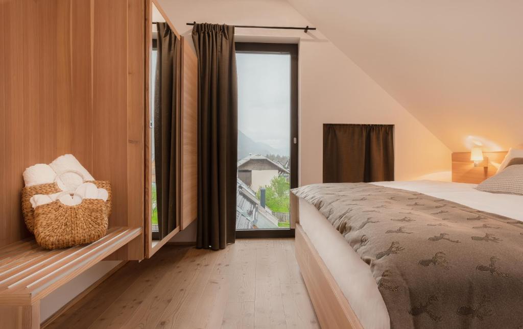 Postel nebo postele na pokoji v ubytování Boutique Skipass Superior Hotel