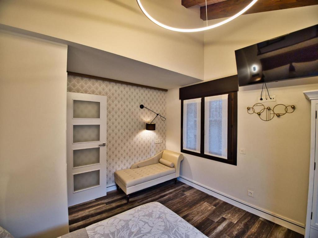 Postel nebo postele na pokoji v ubytování Apartamentos Valle de Ordesa-Torla