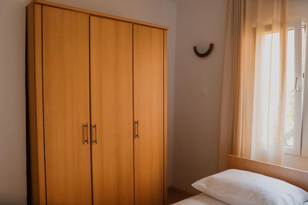 Posteľ alebo postele v izbe v ubytovaní Apartments Prce