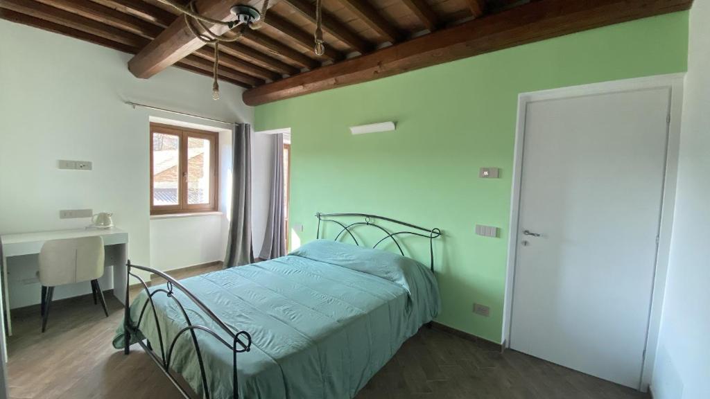 Tempat tidur dalam kamar di Cascina il Germoglio