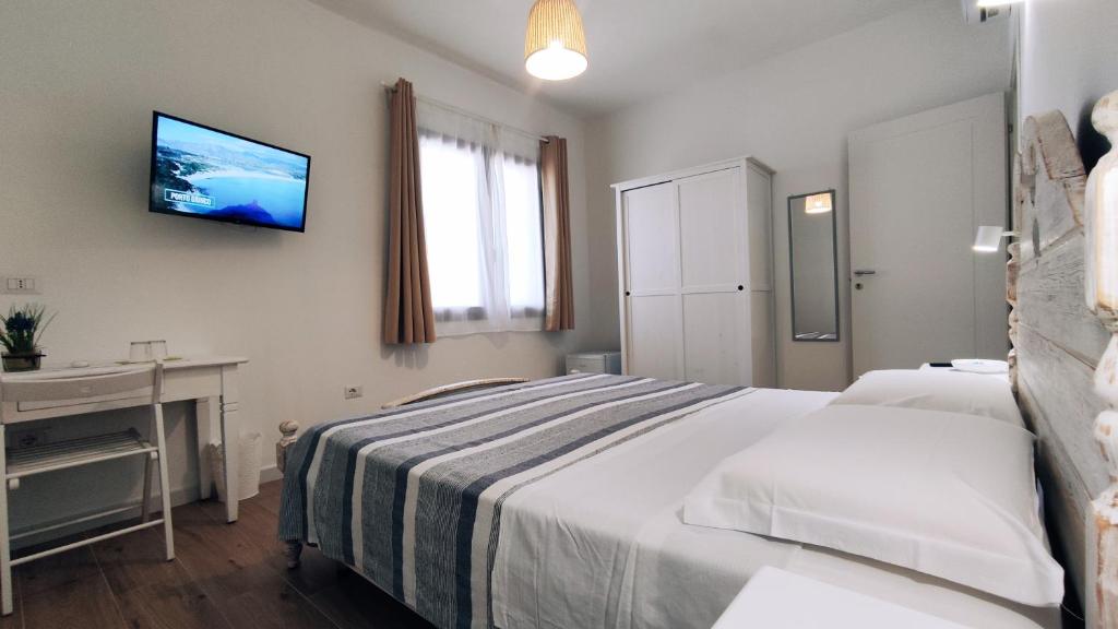 Postel nebo postele na pokoji v ubytování B&B Va' Pensiero