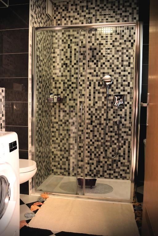 Kúpeľňa v ubytovaní Apartman Elly