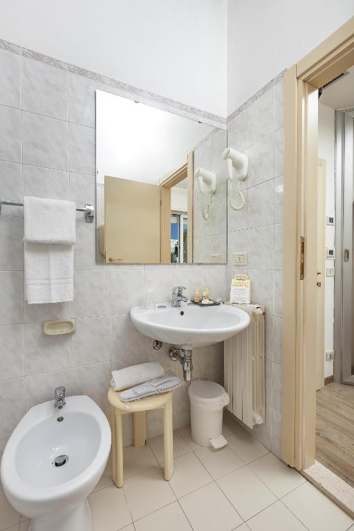 Koupelna v ubytování Ariminum Hotel